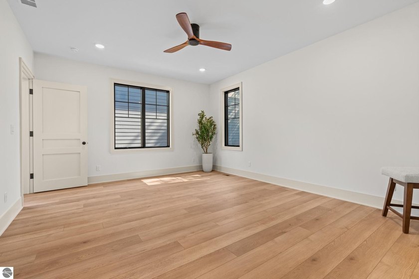Experience elevated luxury in this brand-new, ground-floor condo - photo 24