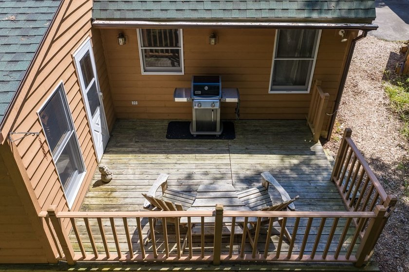 Tucked away in the woods and just a short walk from deeded water - photo 25