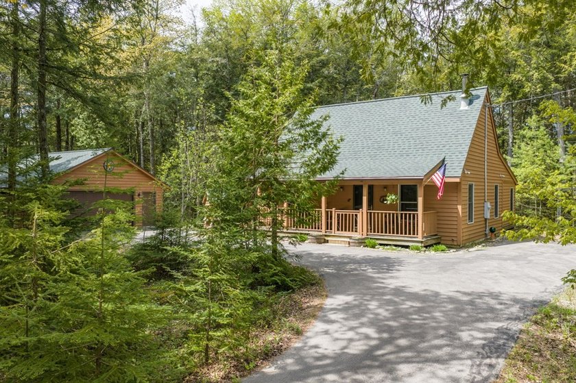 Tucked away in the woods and just a short walk from deeded water - photo 33