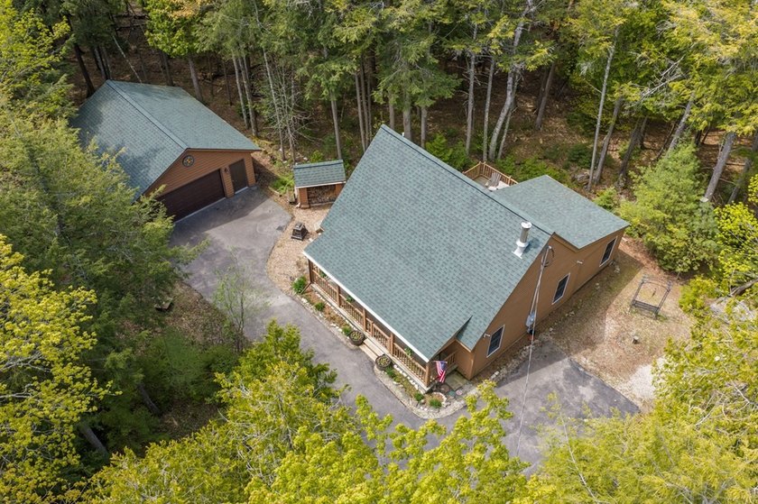 Tucked away in the woods and just a short walk from deeded water - photo 35