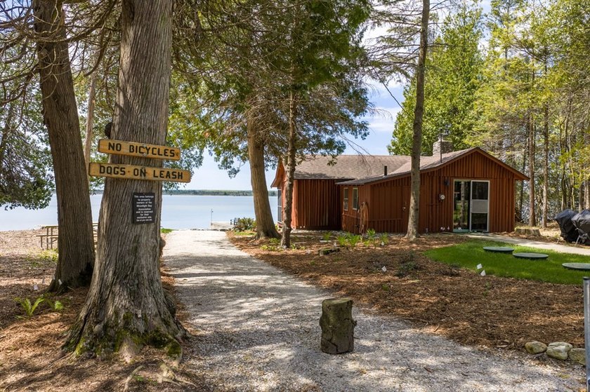 Tucked away in the woods and just a short walk from deeded water - photo 40