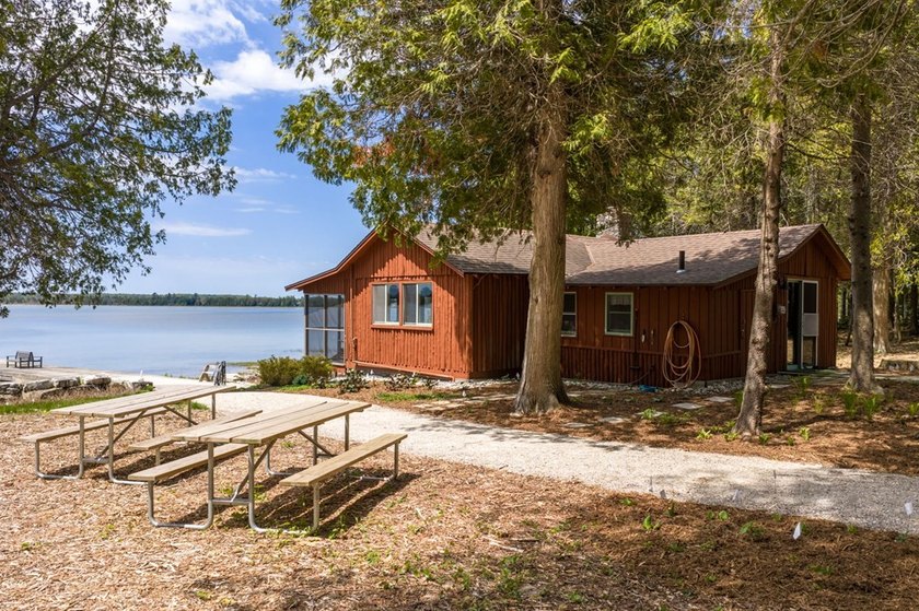 Tucked away in the woods and just a short walk from deeded water - photo 41