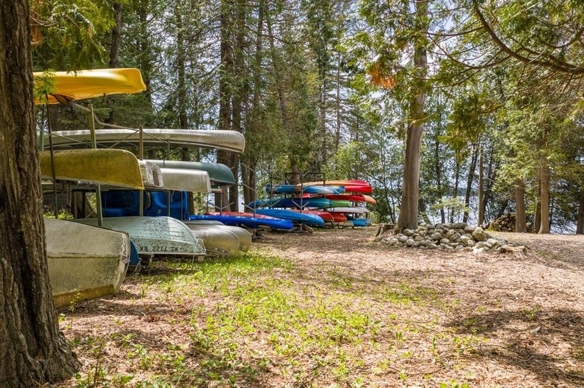 Tucked away in the woods and just a short walk from deeded water - photo 42