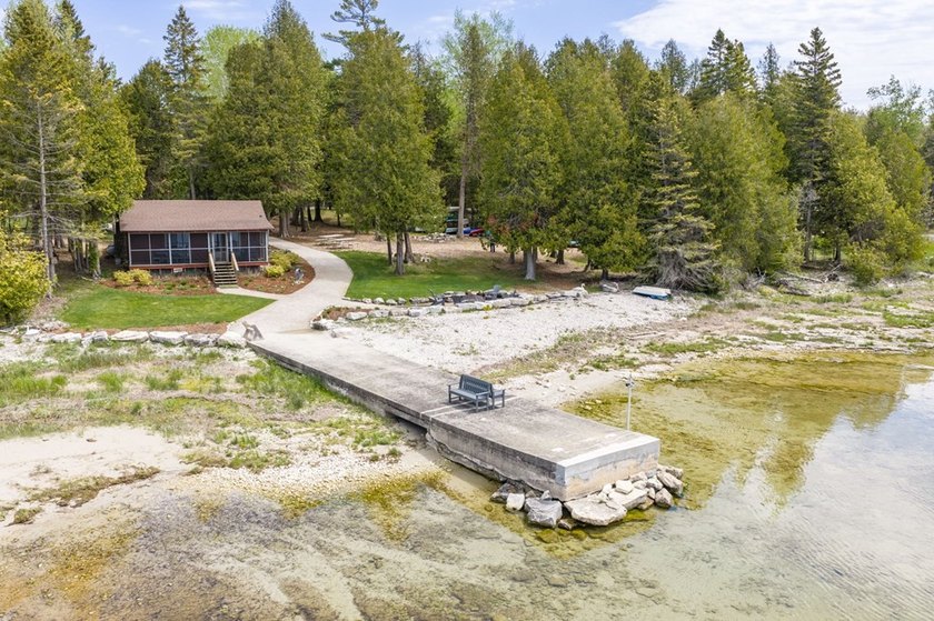 Tucked away in the woods and just a short walk from deeded water - photo 45