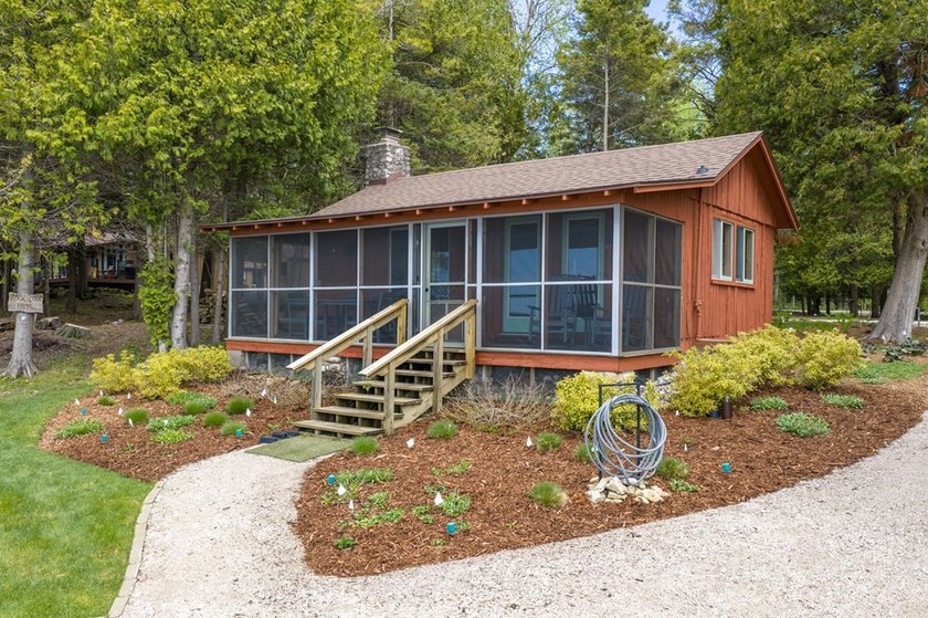Tucked away in the woods and just a short walk from deeded water - photo 46