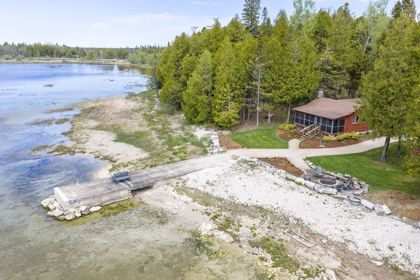 Tucked away in the woods and just a short walk from deeded water - photo 47