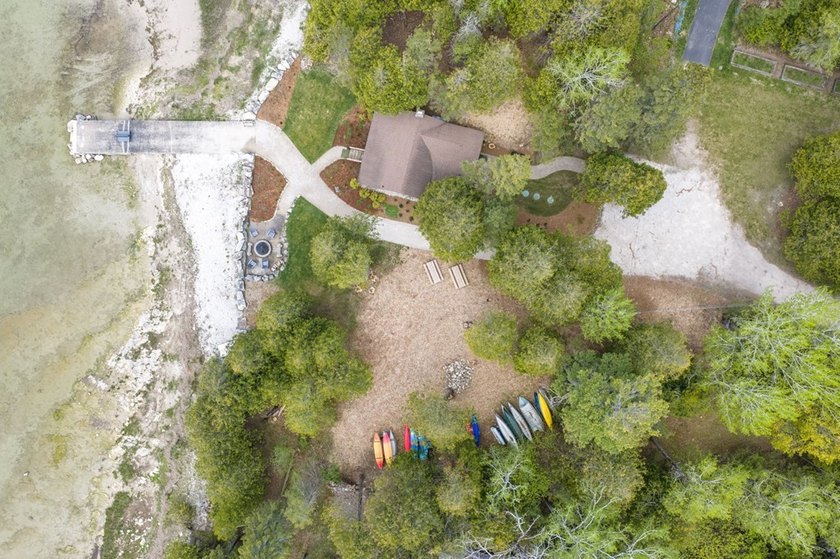Tucked away in the woods and just a short walk from deeded water - photo 48