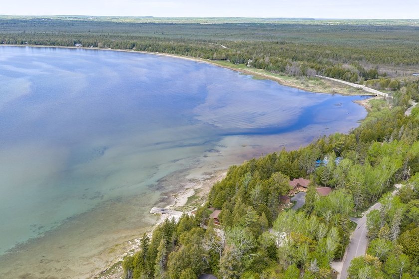 Tucked away in the woods and just a short walk from deeded water - photo 49