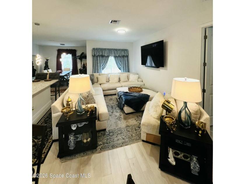 Custom-built in 2022, this beautifully designed 3-bedroom - photo 4