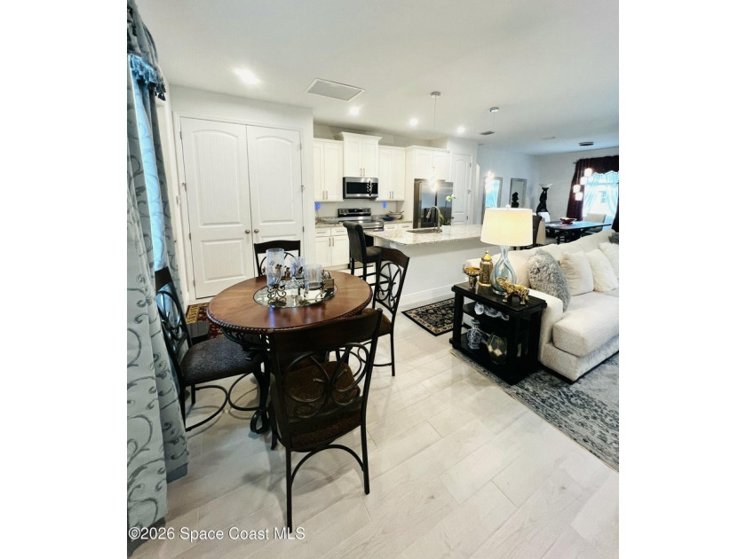 Custom-built in 2022, this beautifully designed 3-bedroom - photo 8