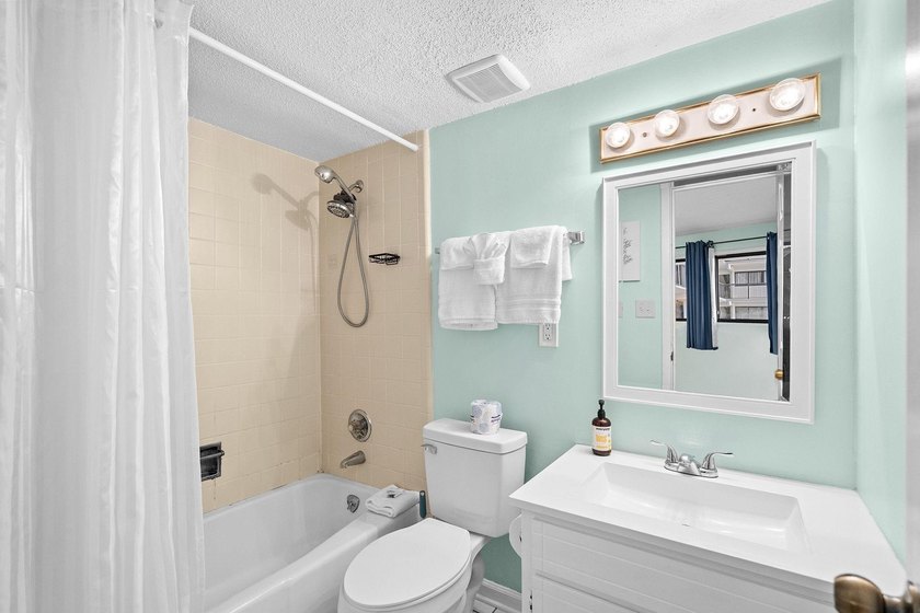 Experience the coastal resort lifestyle from this beautifully - photo 31