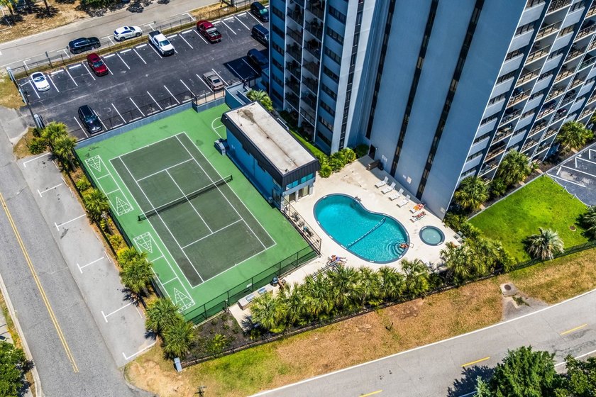 Experience the coastal resort lifestyle from this beautifully - photo 34