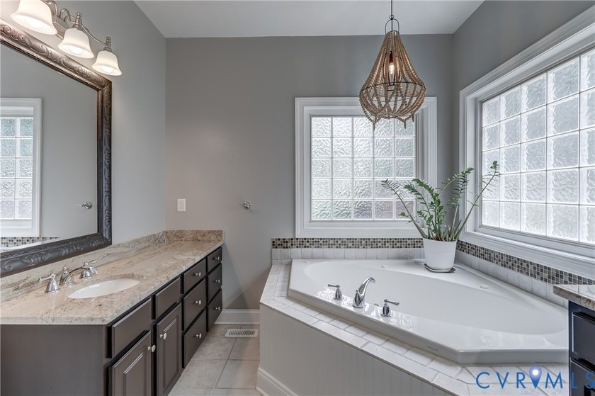 Welcome to this beautifully maintained brick-front home in the - photo 23