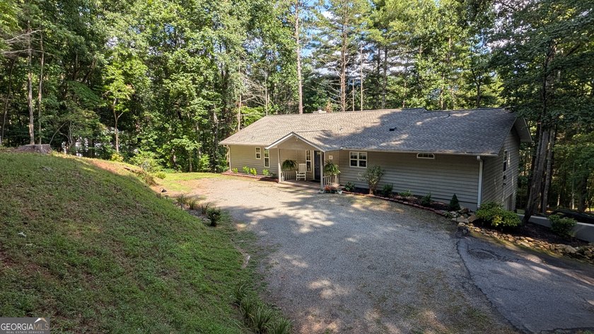 Welcome to 5302 Summerwood Lane, a very private home set high - photo 11
