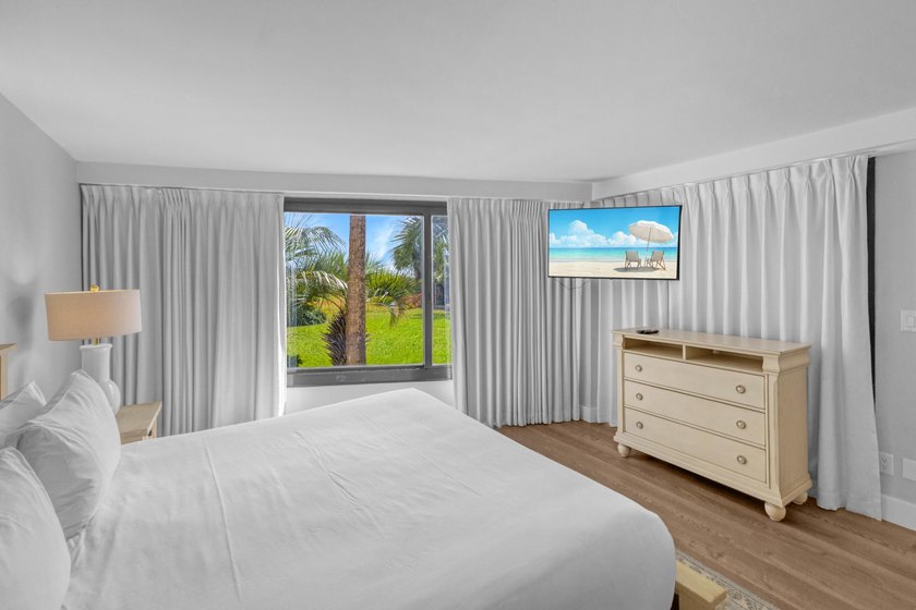 This beautifully appointed 2-bedroom, 2-bath condo is move-in or - photo 15