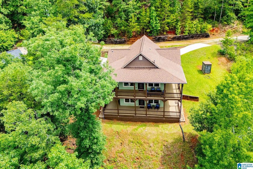 THIS LAKE FRONT HOME WITH AN OPEN FLOOR PLAN OFFERS COMFORT AND - photo 11