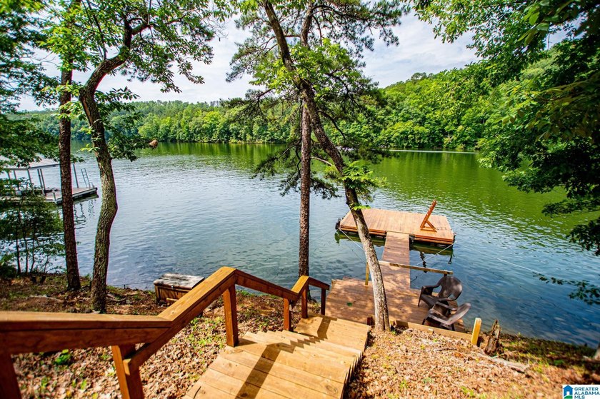 THIS LAKE FRONT HOME WITH AN OPEN FLOOR PLAN OFFERS COMFORT AND - photo 13