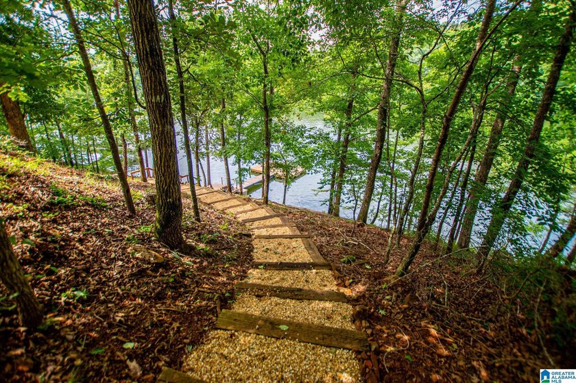 THIS LAKE FRONT HOME WITH AN OPEN FLOOR PLAN OFFERS COMFORT AND - photo 14