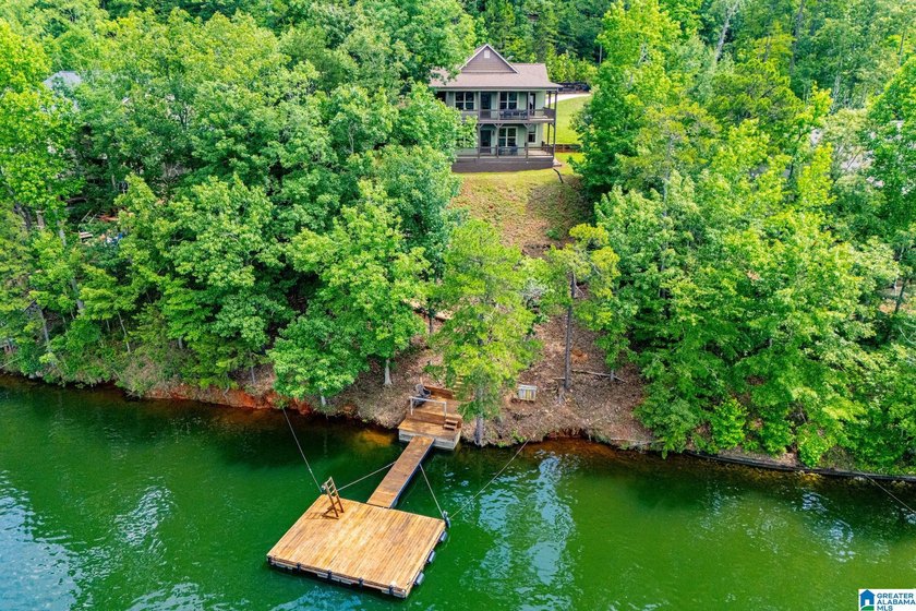 THIS LAKE FRONT HOME WITH AN OPEN FLOOR PLAN OFFERS COMFORT AND - photo 17