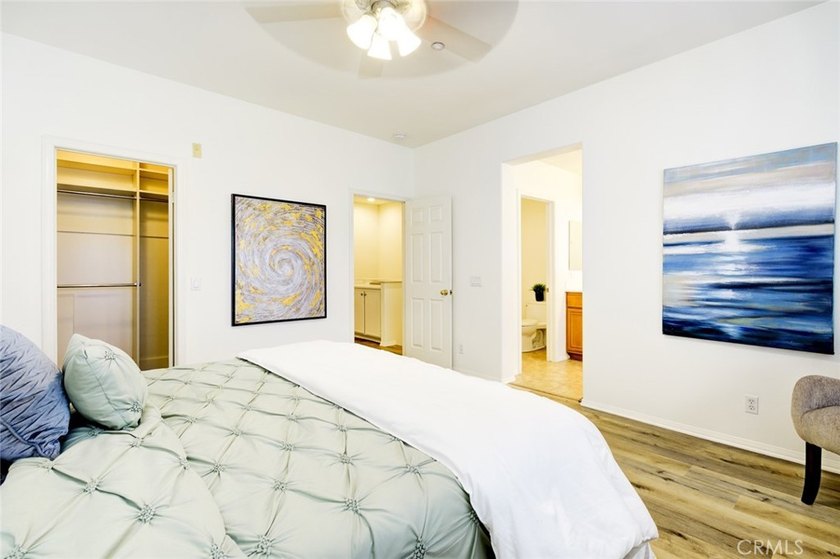 RARE DUAL PRIMARY LAYOUT! Welcome to effortless luxury living in - photo 17