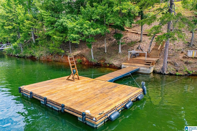 THIS LAKE FRONT HOME WITH AN OPEN FLOOR PLAN OFFERS COMFORT AND - photo 18