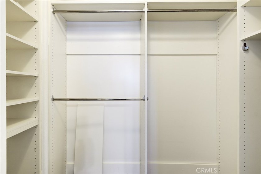 RARE DUAL PRIMARY LAYOUT! Welcome to effortless luxury living in - photo 18