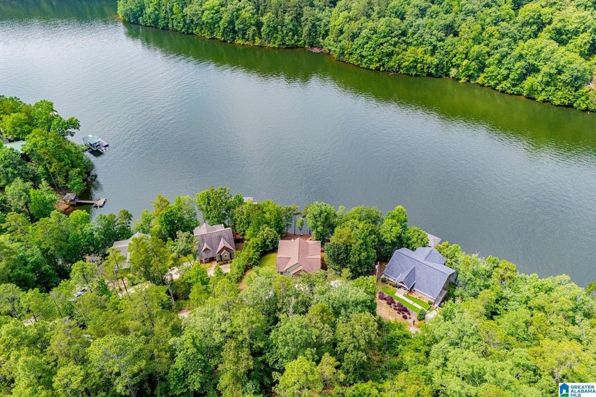 THIS LAKE FRONT HOME WITH AN OPEN FLOOR PLAN OFFERS COMFORT AND - photo 20