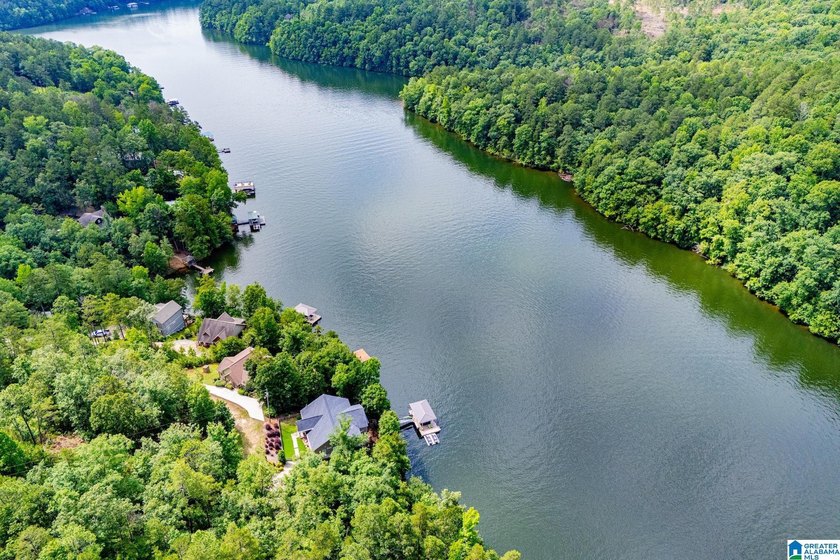 THIS LAKE FRONT HOME WITH AN OPEN FLOOR PLAN OFFERS COMFORT AND - photo 21