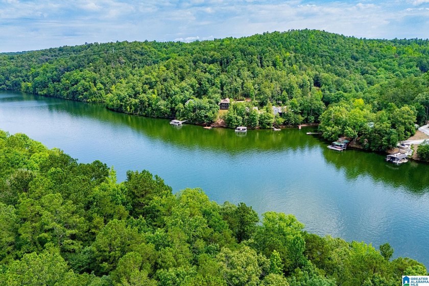 THIS LAKE FRONT HOME WITH AN OPEN FLOOR PLAN OFFERS COMFORT AND - photo 22
