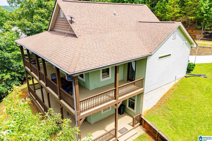THIS LAKE FRONT HOME WITH AN OPEN FLOOR PLAN OFFERS COMFORT AND - photo 25
