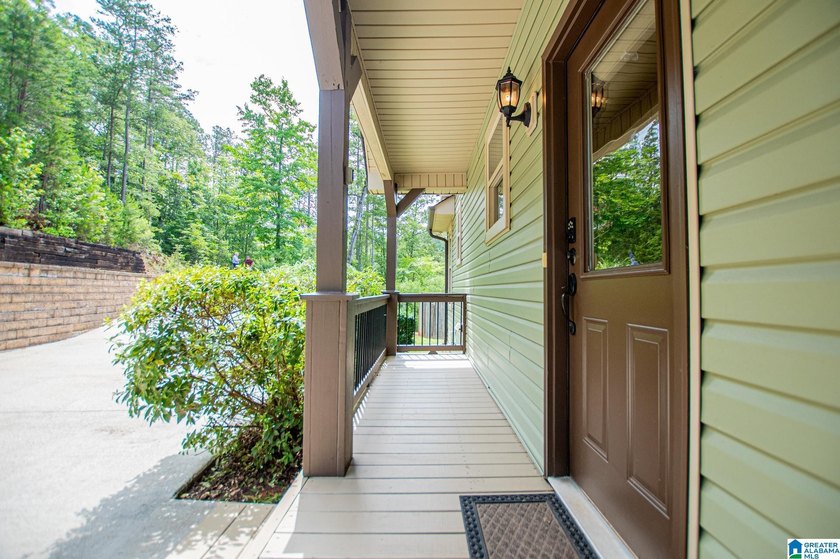 THIS LAKE FRONT HOME WITH AN OPEN FLOOR PLAN OFFERS COMFORT AND - photo 27