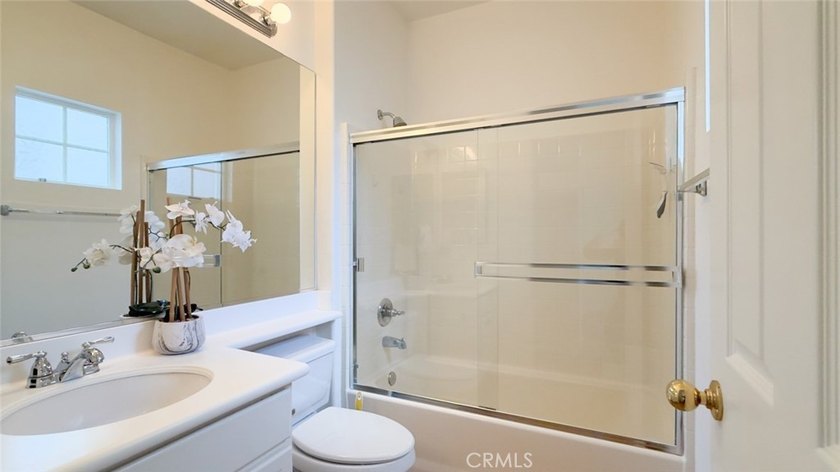 RARE DUAL PRIMARY LAYOUT! Welcome to effortless luxury living in - photo 27