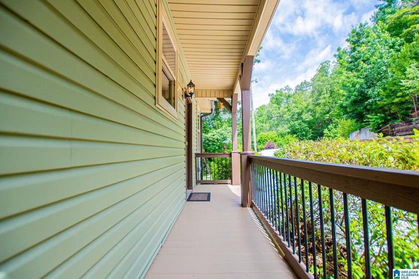 THIS LAKE FRONT HOME WITH AN OPEN FLOOR PLAN OFFERS COMFORT AND - photo 29