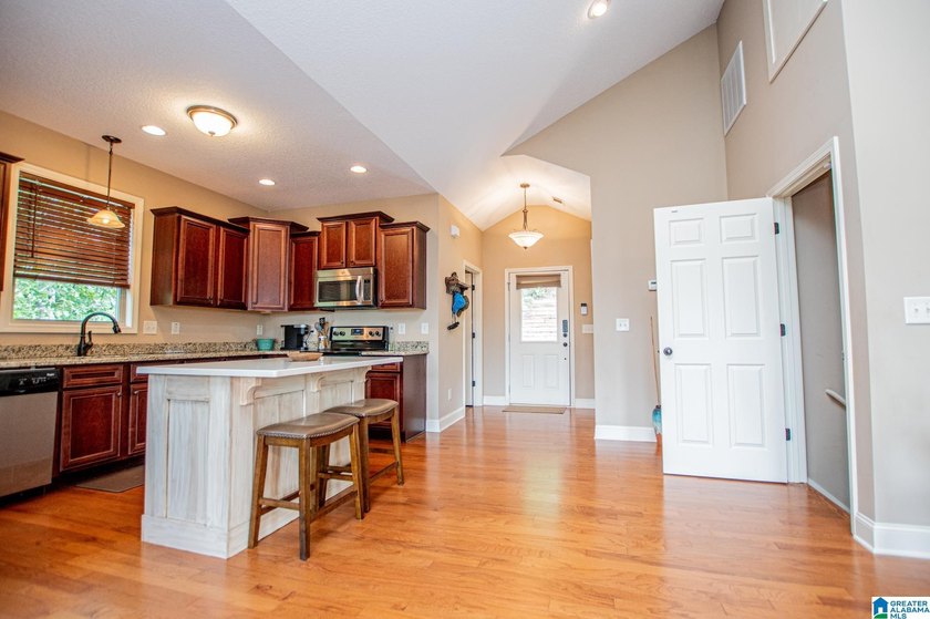 THIS LAKE FRONT HOME WITH AN OPEN FLOOR PLAN OFFERS COMFORT AND - photo 31