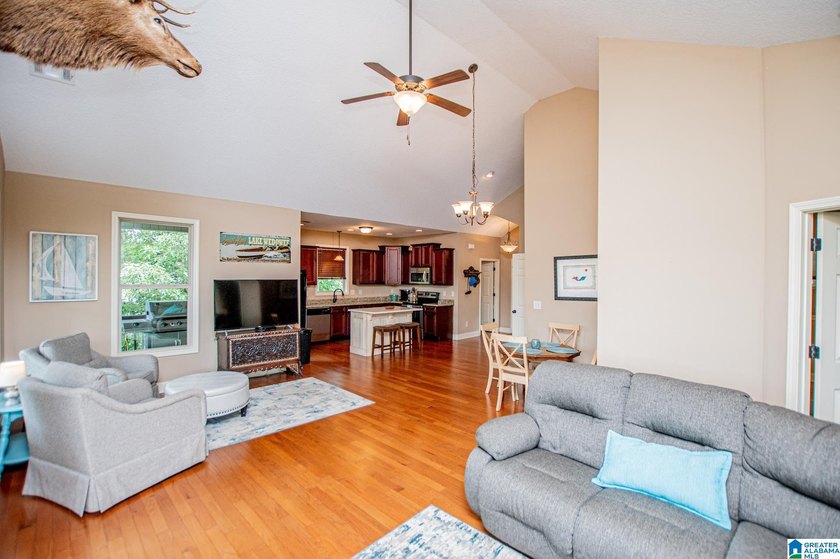 THIS LAKE FRONT HOME WITH AN OPEN FLOOR PLAN OFFERS COMFORT AND - photo 32