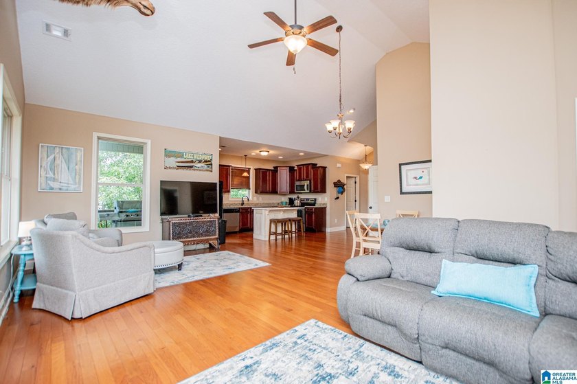 THIS LAKE FRONT HOME WITH AN OPEN FLOOR PLAN OFFERS COMFORT AND - photo 33