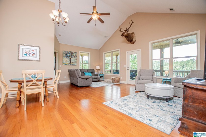 THIS LAKE FRONT HOME WITH AN OPEN FLOOR PLAN OFFERS COMFORT AND - photo 37