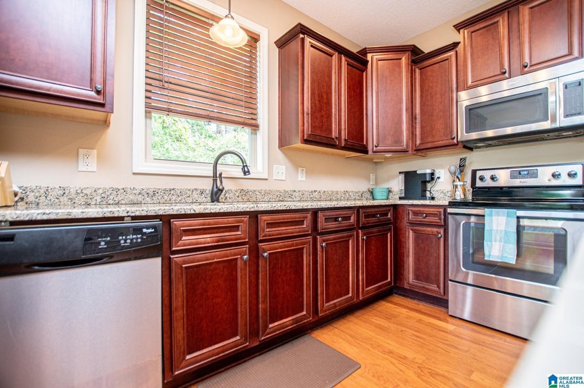 THIS LAKE FRONT HOME WITH AN OPEN FLOOR PLAN OFFERS COMFORT AND - photo 40