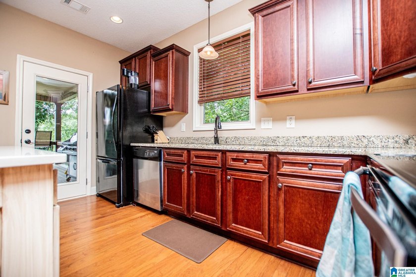 THIS LAKE FRONT HOME WITH AN OPEN FLOOR PLAN OFFERS COMFORT AND - photo 42