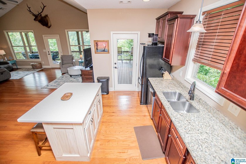THIS LAKE FRONT HOME WITH AN OPEN FLOOR PLAN OFFERS COMFORT AND - photo 46