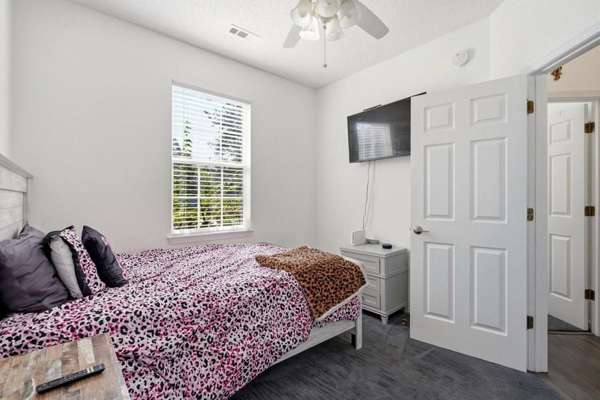 Welcome to this charming 3-bedroom, 2-bath home offering an - photo 21