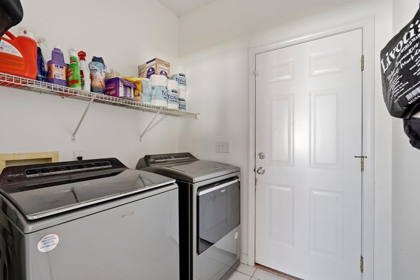 Welcome to this charming 3-bedroom, 2-bath home offering an - photo 22