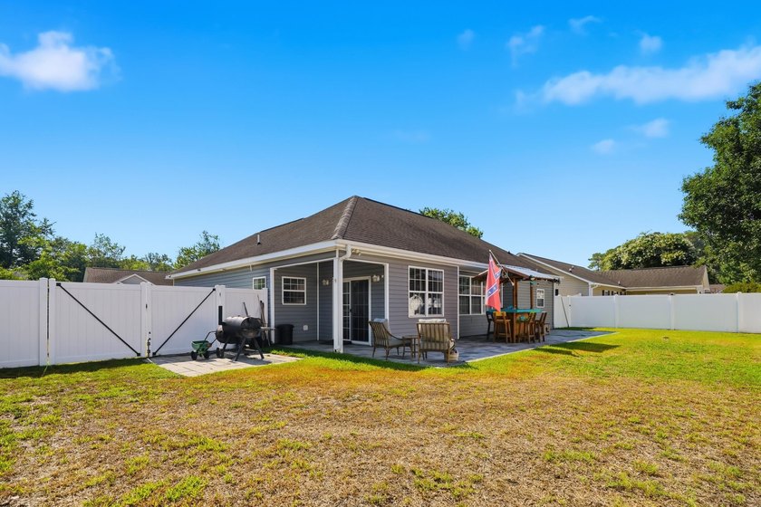 Welcome to this charming 3-bedroom, 2-bath home offering an - photo 25