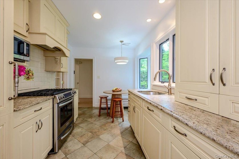 Welcome to this one-of-a-kind gem in the prestigious Village of - photo 12