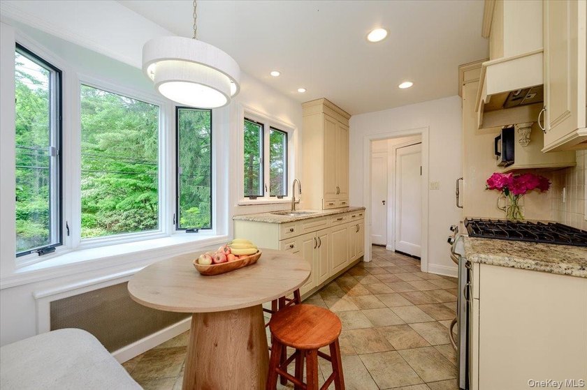 Welcome to this one-of-a-kind gem in the prestigious Village of - photo 13
