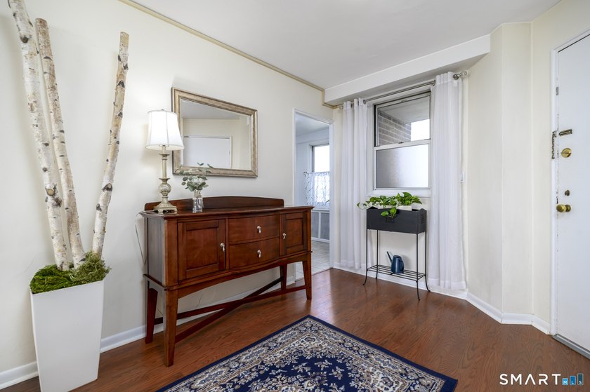 Perched just under the top floor, this stunning 2BR/1BA condo - photo 5