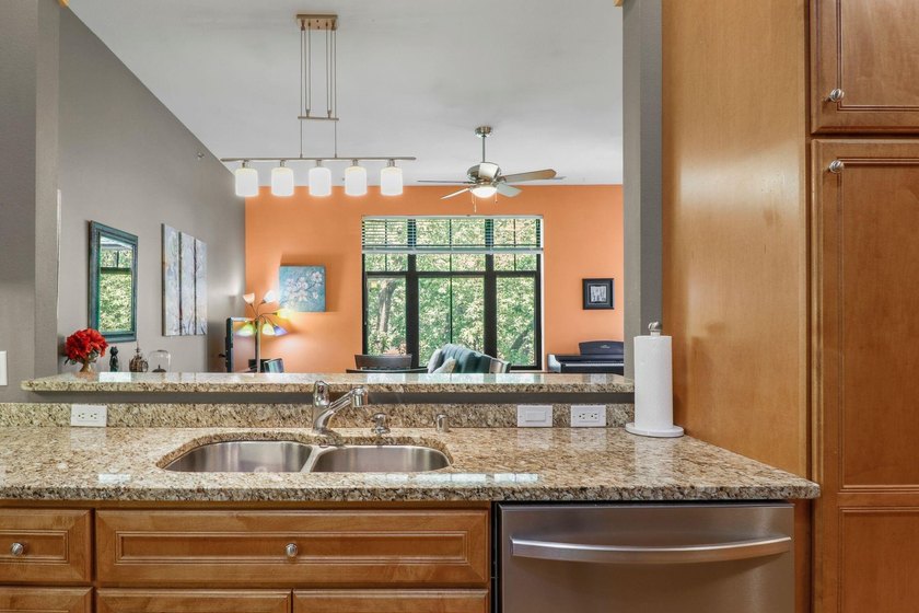 Perched on the top floor, this spacious 1BR condo offers an - photo 11