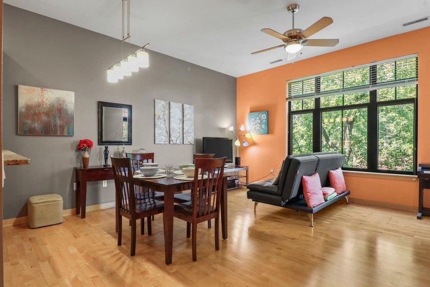 Perched on the top floor, this spacious 1BR condo offers an - photo 12