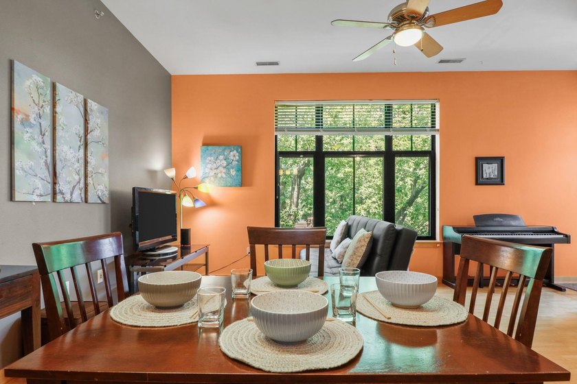 Perched on the top floor, this spacious 1BR condo offers an - photo 14