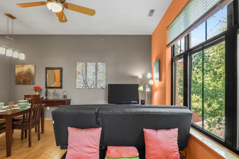 Perched on the top floor, this spacious 1BR condo offers an - photo 15
